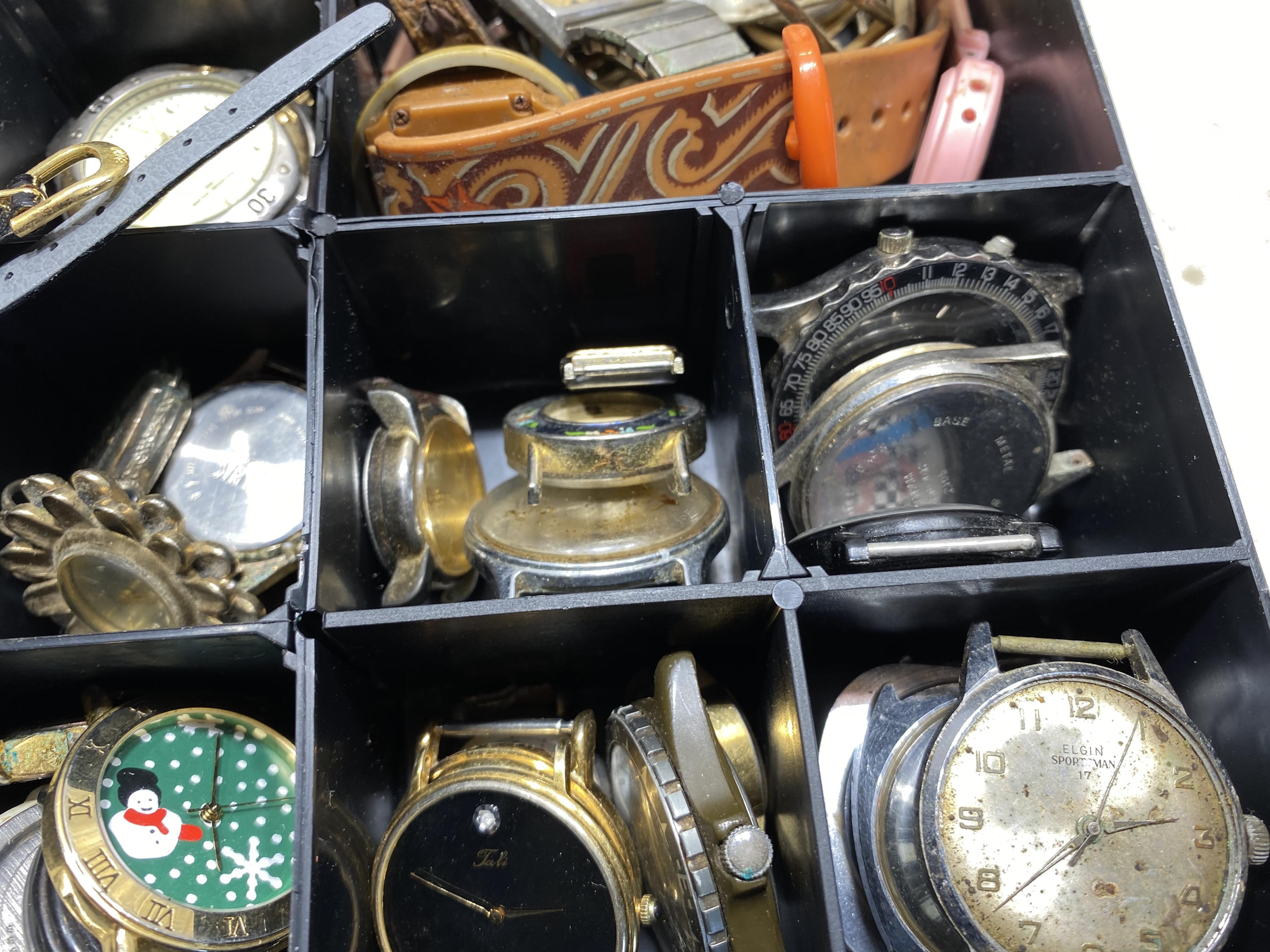 Case lot of assorted vintage watches