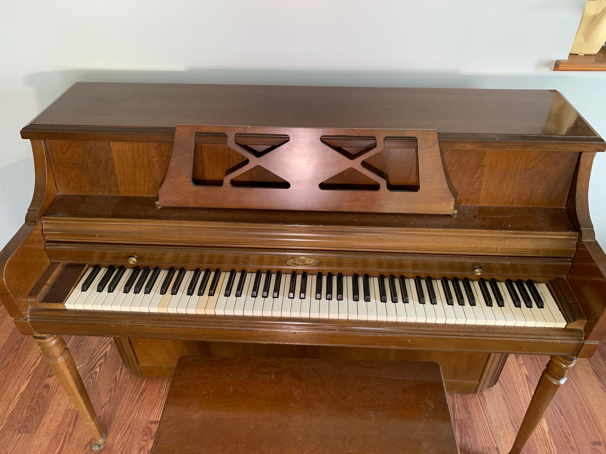 Wurlitzer Piano with Bench.