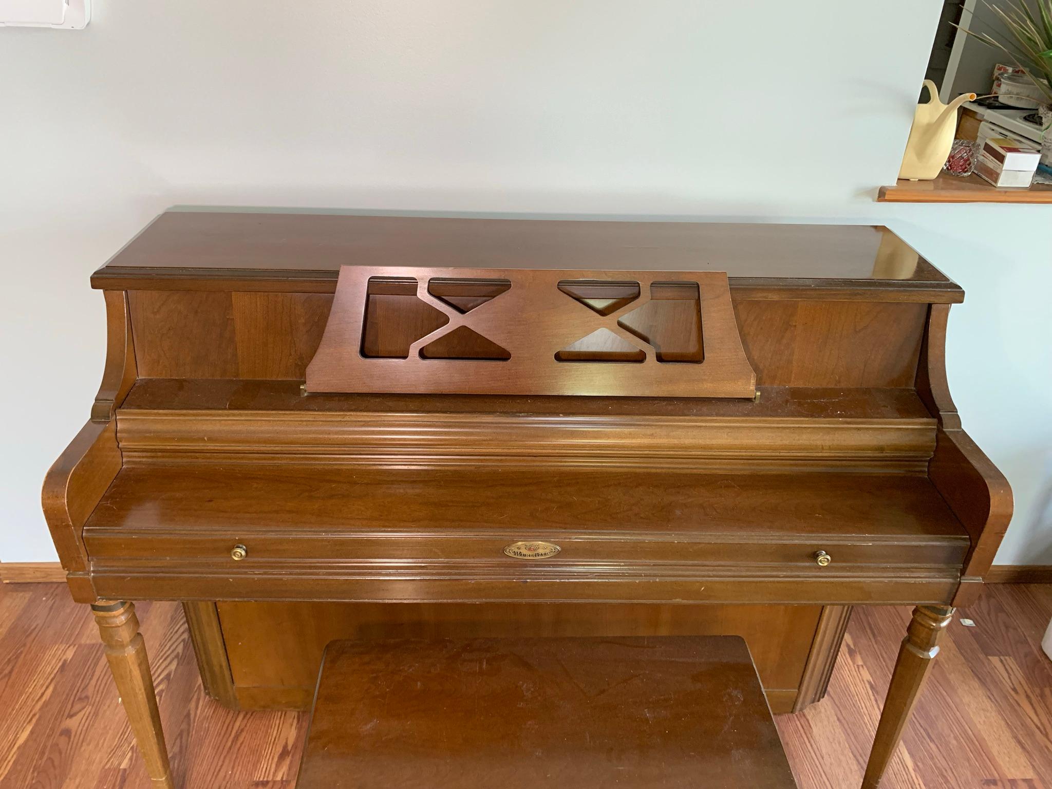Wurlitzer Piano with Bench.