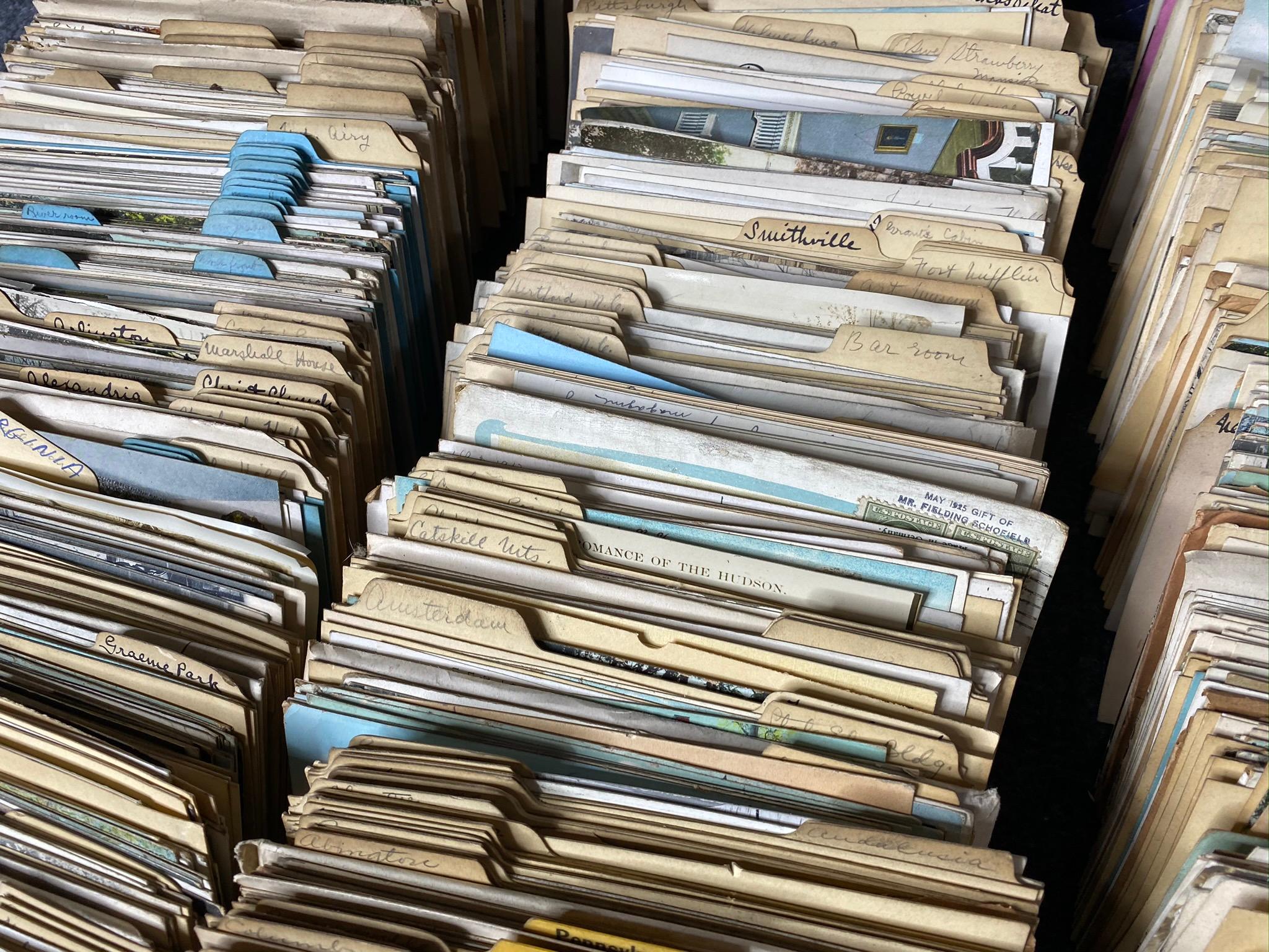 Large lot of assorted souvenir postcards