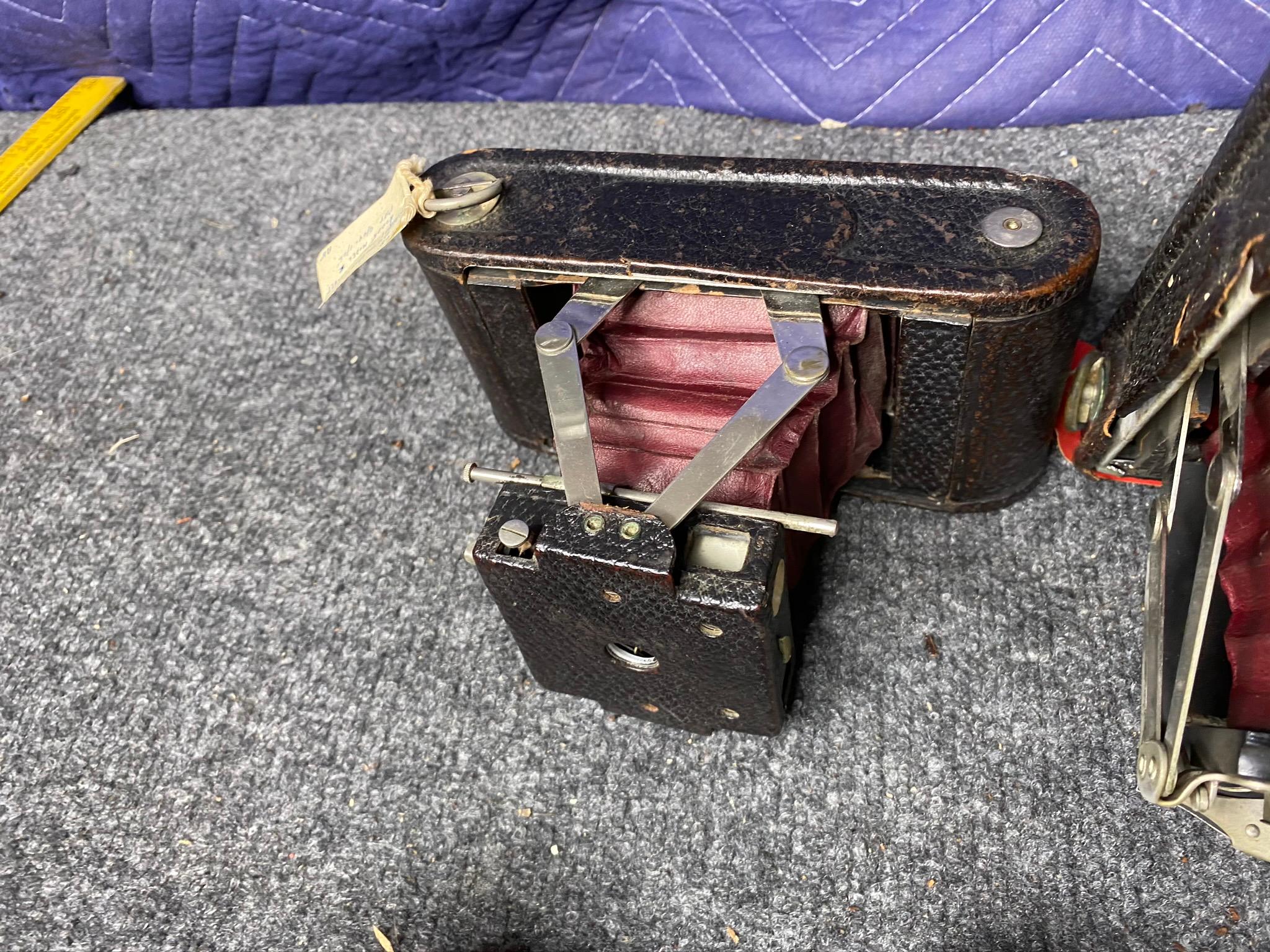 Group lot of folding cameras and accessories