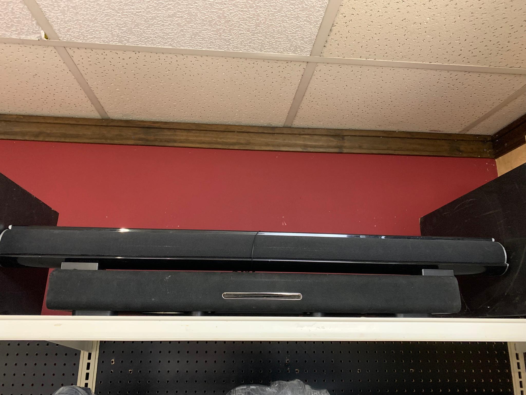 Group of Sound Bars and Subwoofers