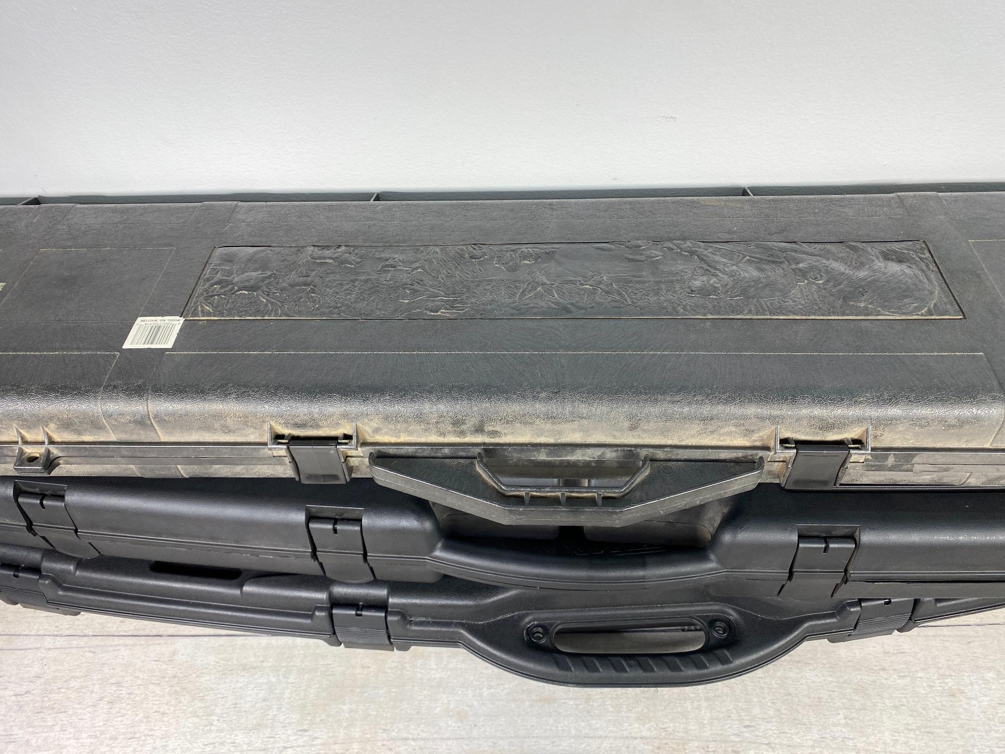 Three plastic rifle cases