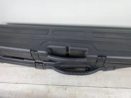 Three plastic rifle cases