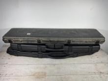 Three plastic rifle cases