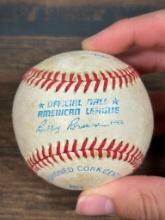 Ken Griffey Jr. & Ken Griffey Sr., signed MLB baseball, SGC, in a display case