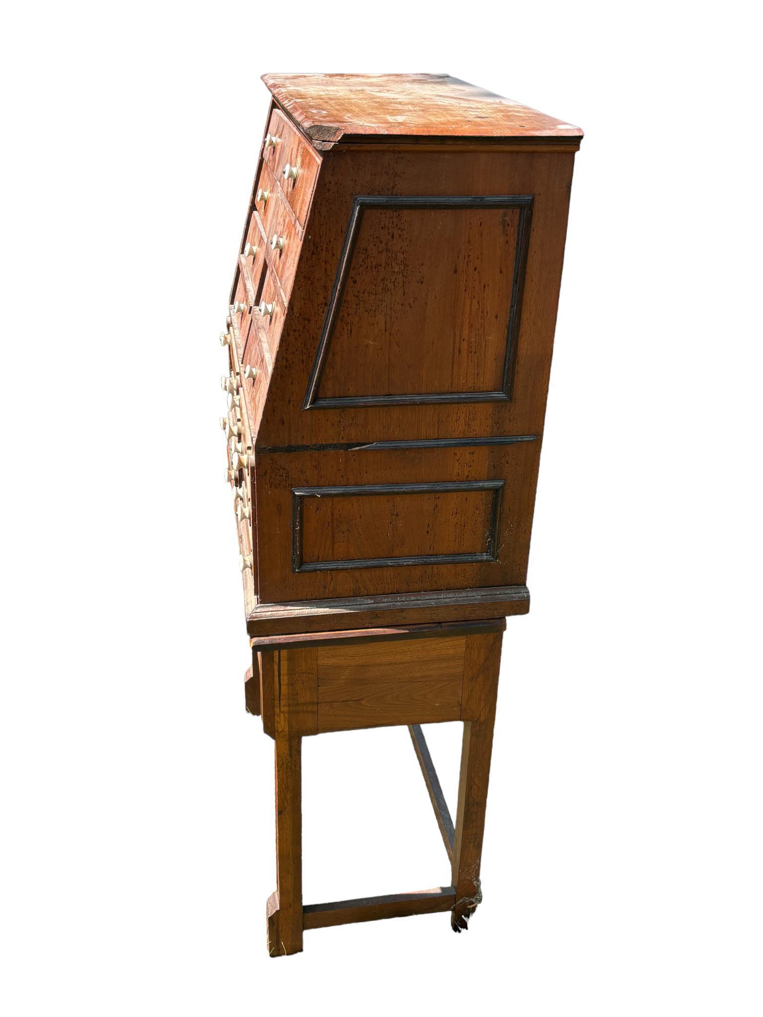 Antique Multi-Drawer Cabinet with Angled Front