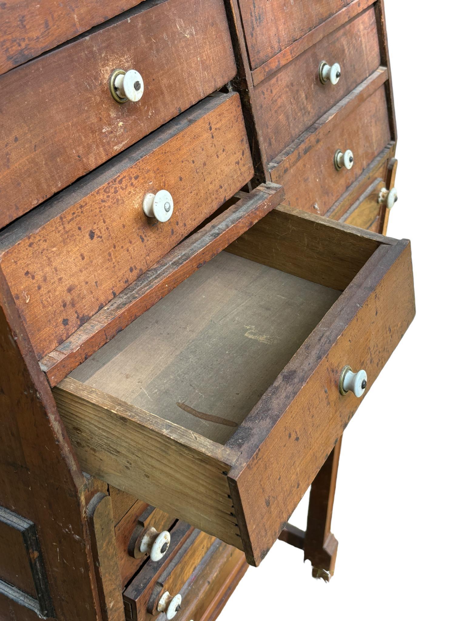 Antique Multi-Drawer Cabinet with Angled Front