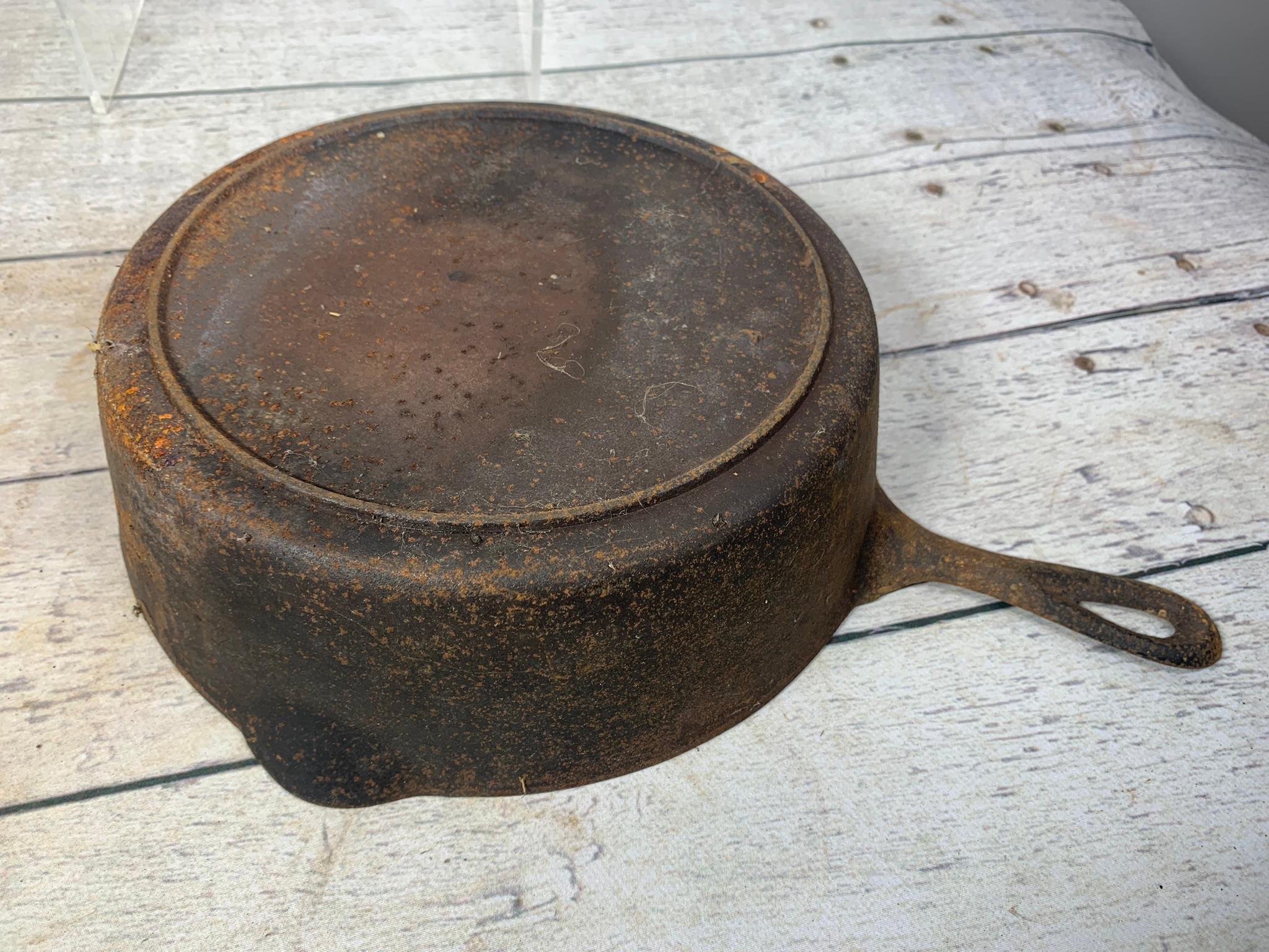 A Wagner Ware Cast Iron Skillet and a Cast Iron Chicken Fryer with Lid