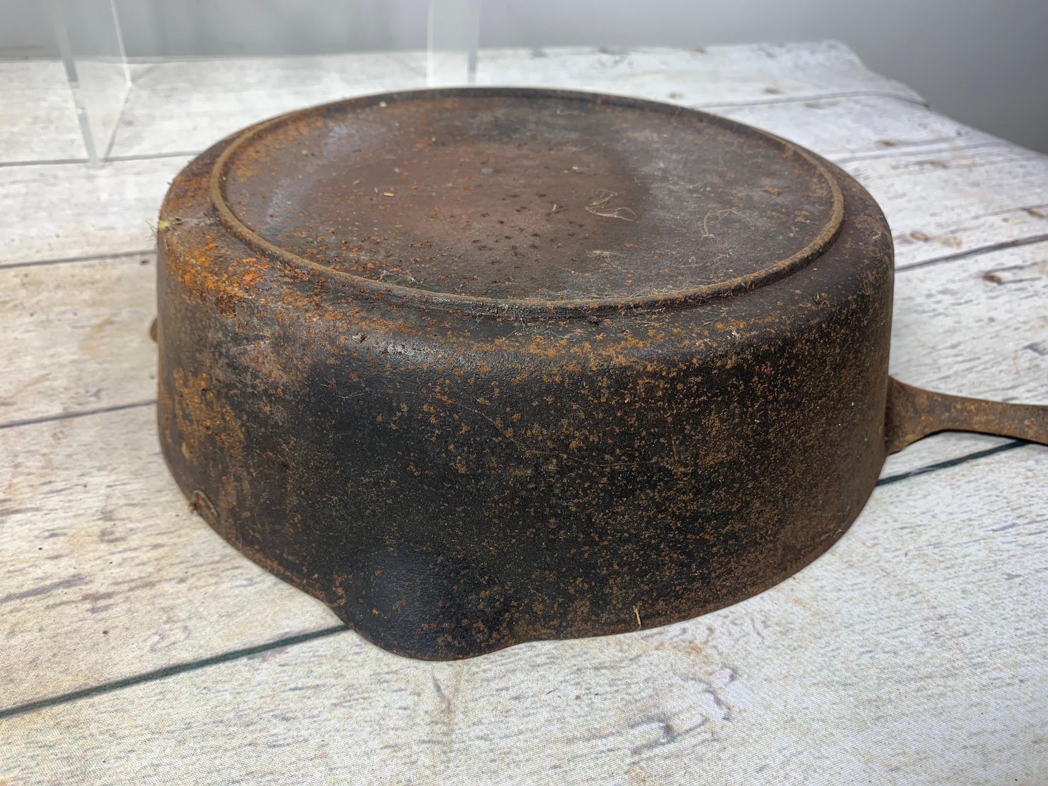 A Wagner Ware Cast Iron Skillet and a Cast Iron Chicken Fryer with Lid