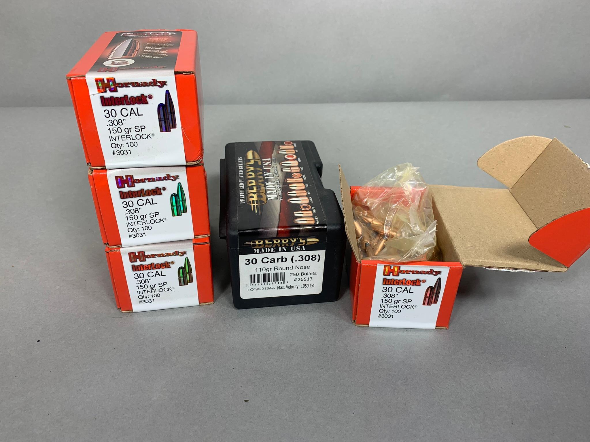 Four Full Boxes, One Opened 30 Cal Bullets for Reloading