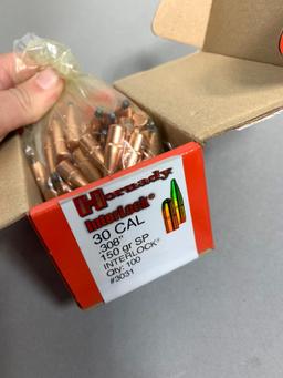 Four Full Boxes, One Opened 30 Cal Bullets for Reloading