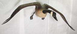 full size, life like Ted Hanks 1978 wood carved Canadian Goose in flight