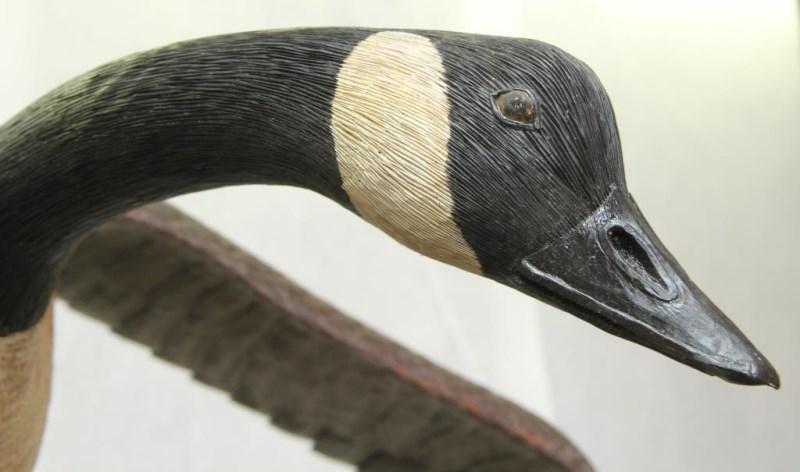 full size, life like Ted Hanks 1978 wood carved Canadian Goose in flight