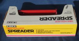 NEW HOLLAND SPREADER - NIB