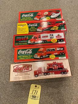 5 Coca-Cola trucks