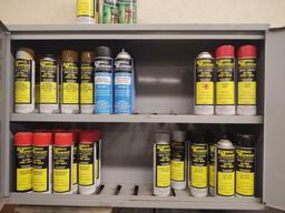 Metal two-door wall cabinet with assorted spray paints