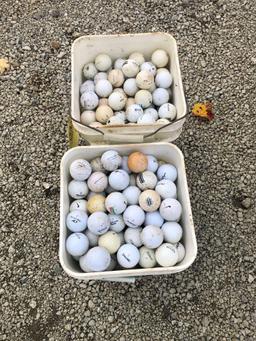 2 buckets of golf balls