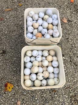 2 buckets of golf balls