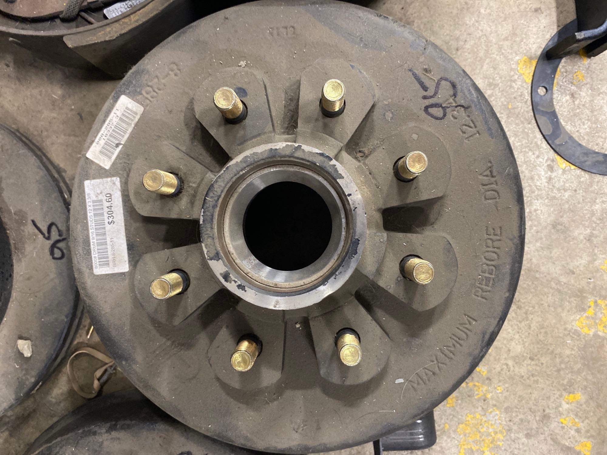 Assorted trailer drum hubs, some new, leaf spring