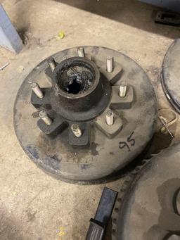 Assorted trailer drum hubs, some new, leaf spring