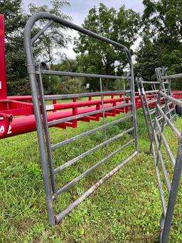 Lot of Priefert 8? gate and swinging corral panel.