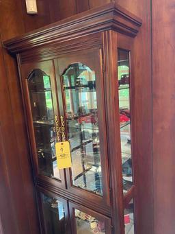 Mirrored back lighted Curio Cabinet
