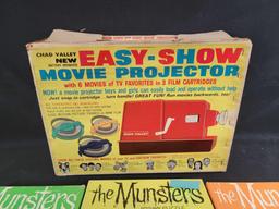 3 1965 Whitman The Munsters jigsaw puzzles complete and Chad Valley batt op movie projectorl