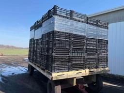 40 plastic produce bins on a pallet