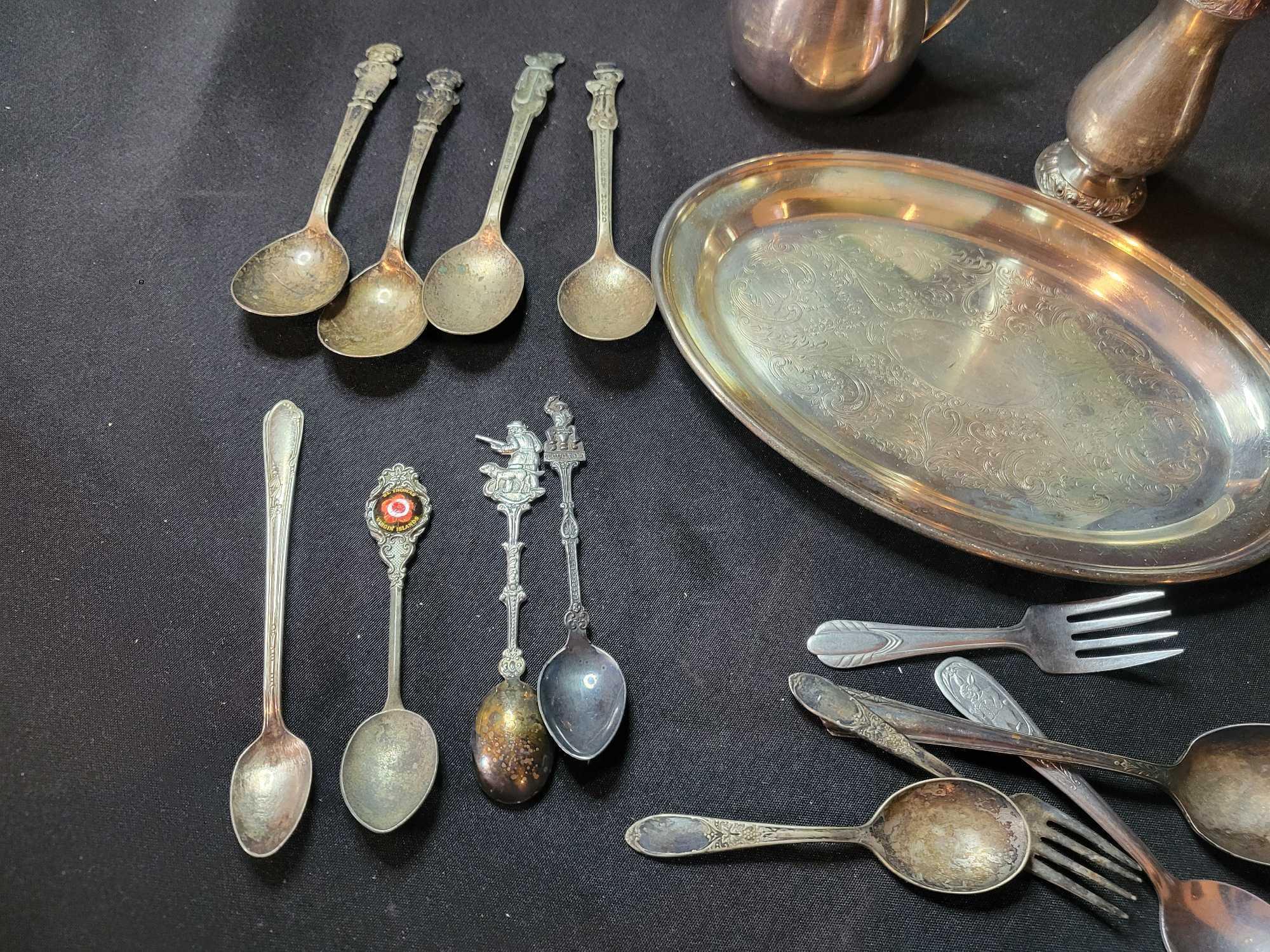 Group of mostly plated flatware, one piece marked sterling and additional spoon believed to be