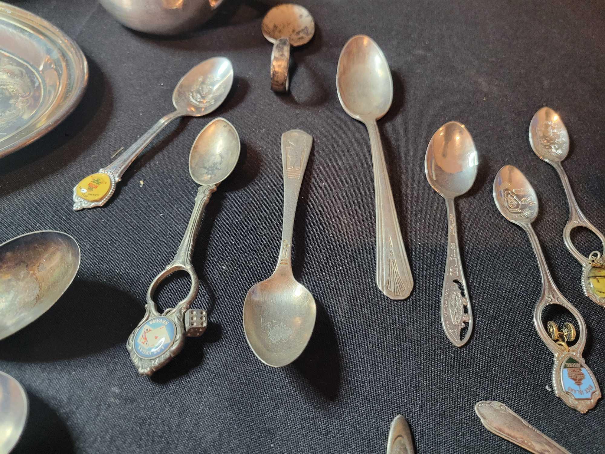 Group of mostly plated flatware, one piece marked sterling and additional spoon believed to be