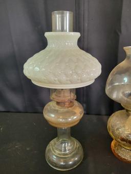 Pair of vintage oil lamps, one with milk glass shade