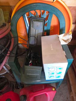 Gas Cans, Grill, Battery Charger, Plastic Patio Chairs