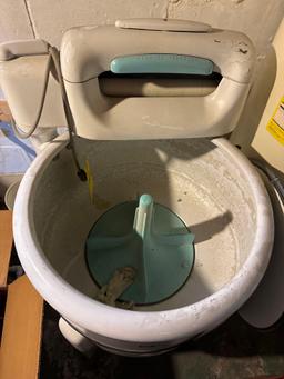 Maytag wringer washer located in basement