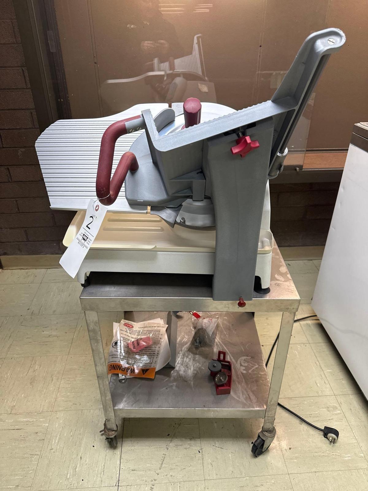 Berkel model x13A meat slicer with stainless steel cart