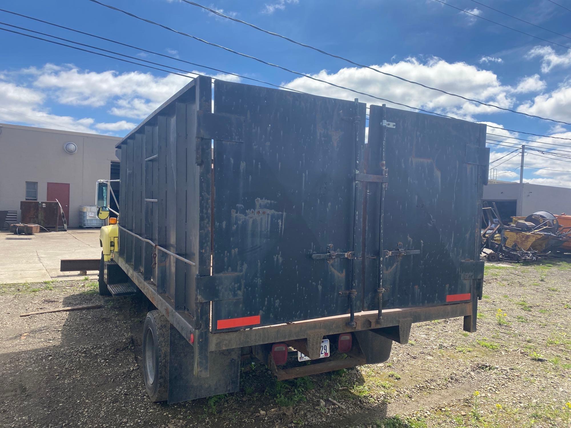 1992 GMC 6500 Topkick, 20yd full hydraulic container dump truck.