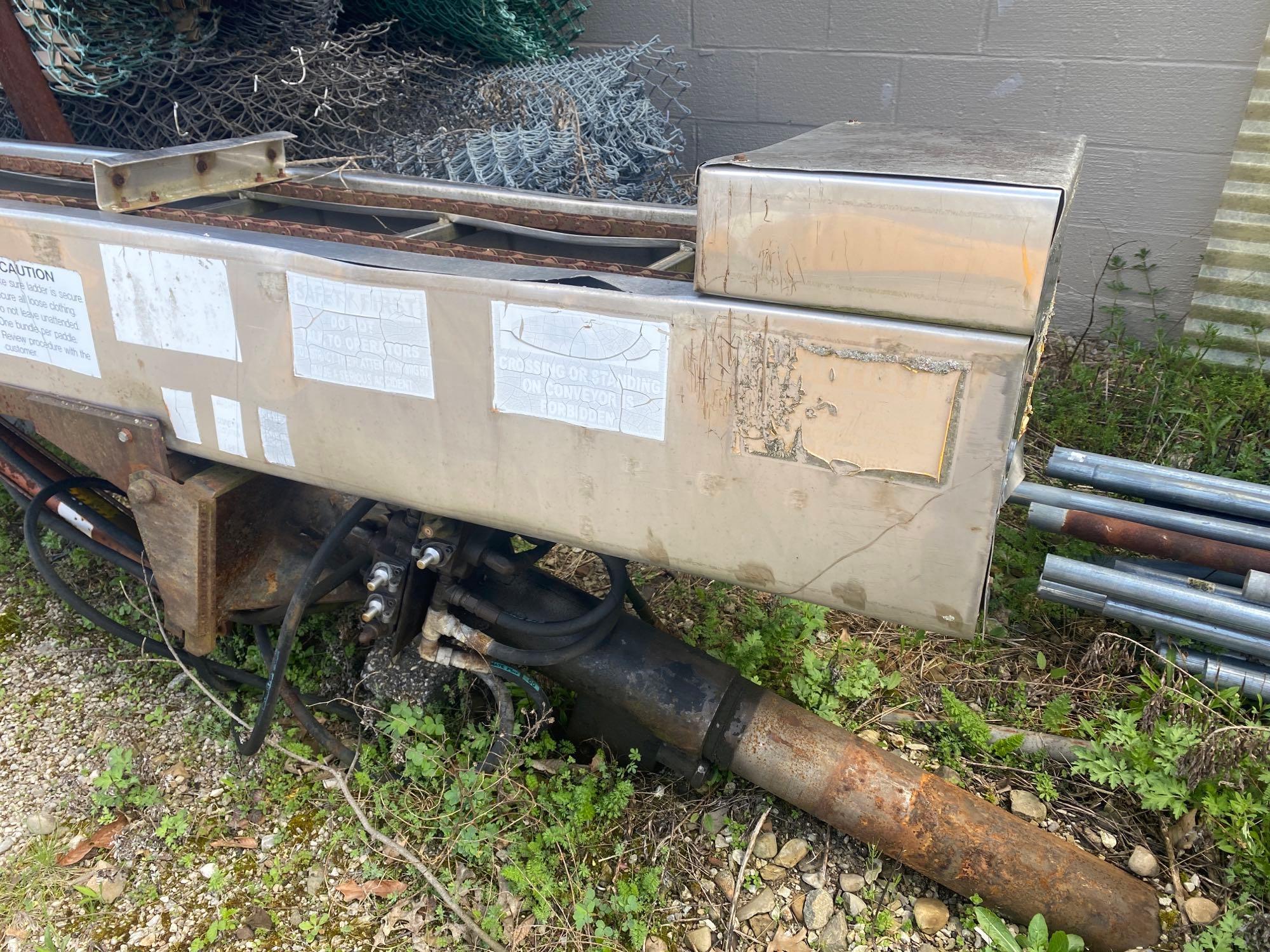 Hydraulic shingle conveyor, truck mounted, condition unknown.