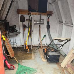 Remaining Contents of Shed - Yard Tools, Electric Yard Tools, Stand, & Worx Mower (Missing Battery)