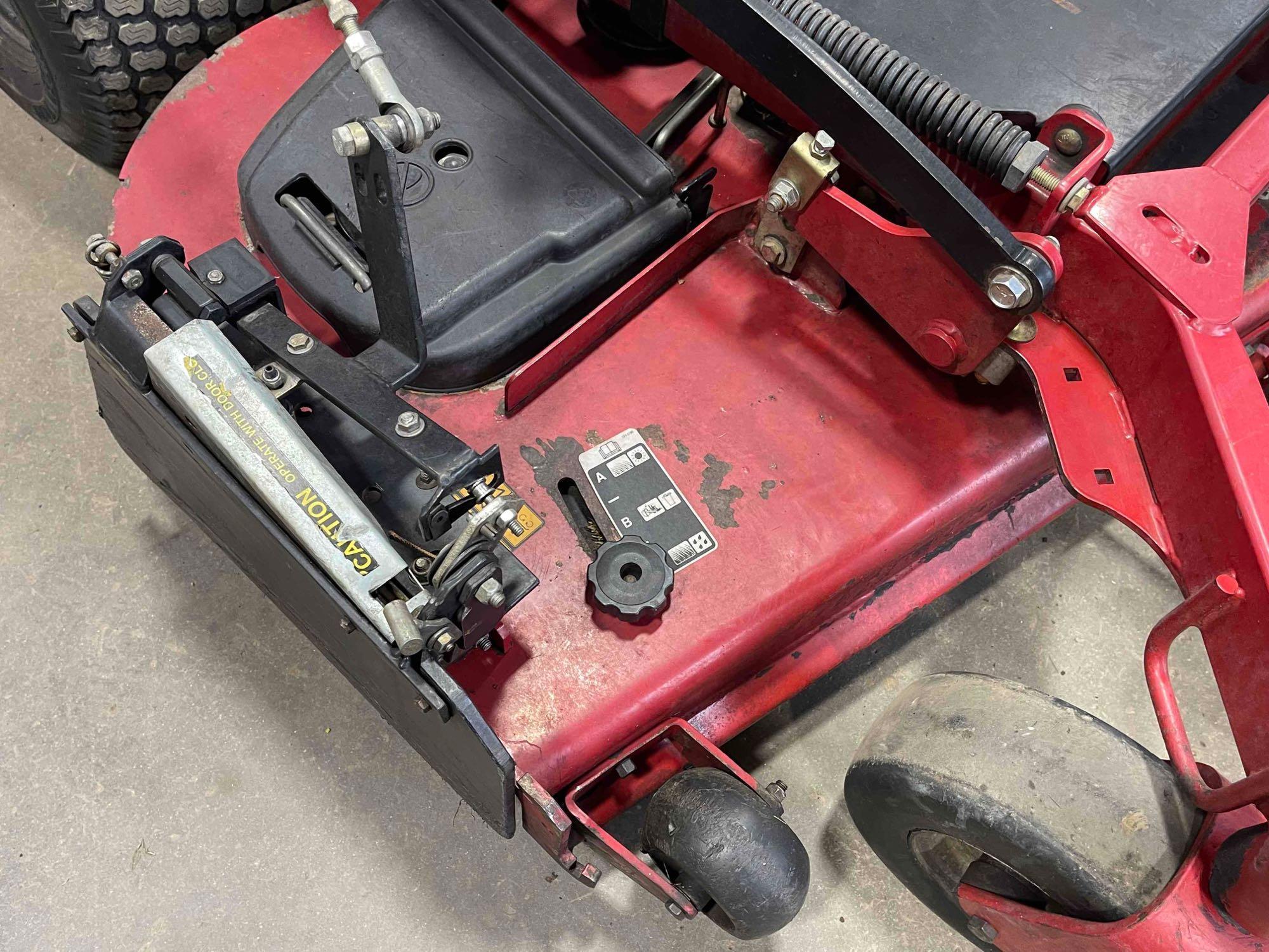 Toro Grandstand mower 60 inch 1,686 hrs. runs