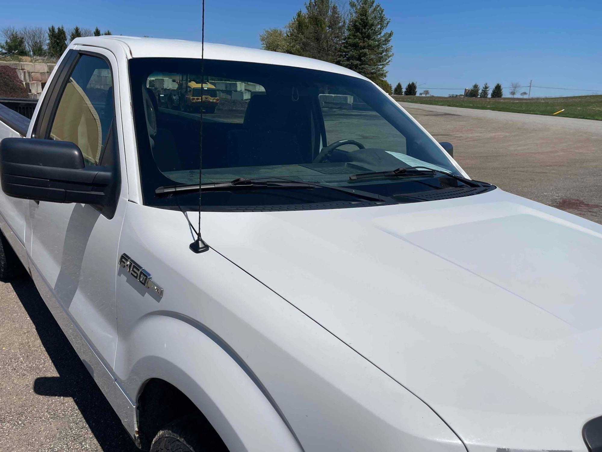 2012 Ford F-150 with 126,546 mi.