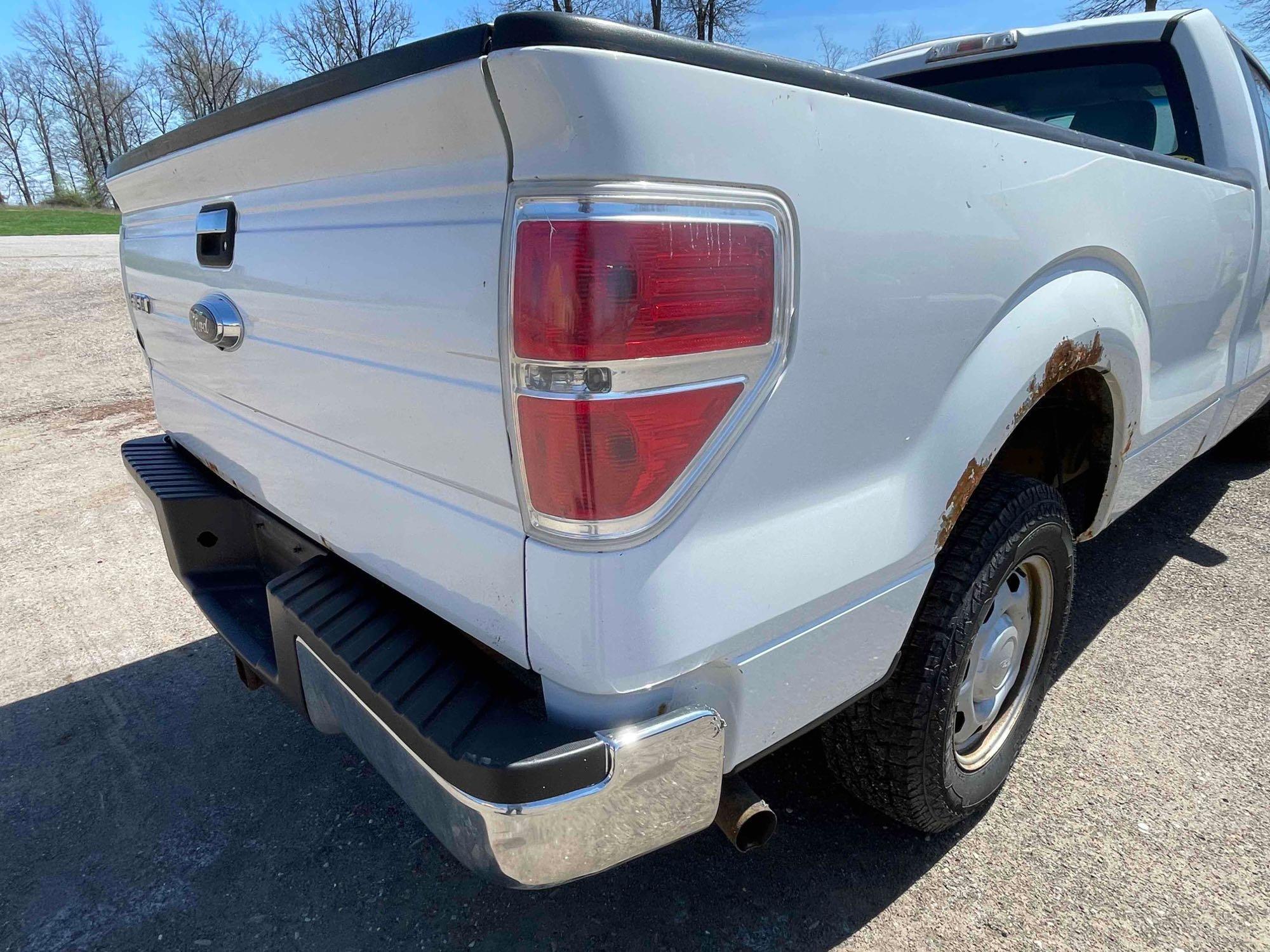 2012 Ford F-150 with 126,546 mi.