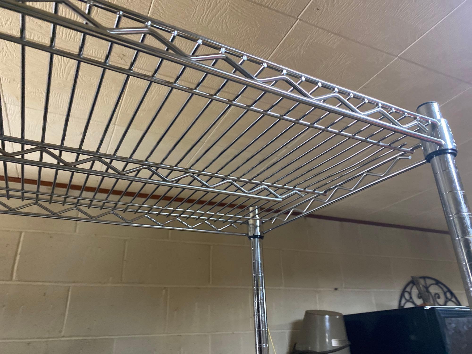 2 metal wire rack on wheels