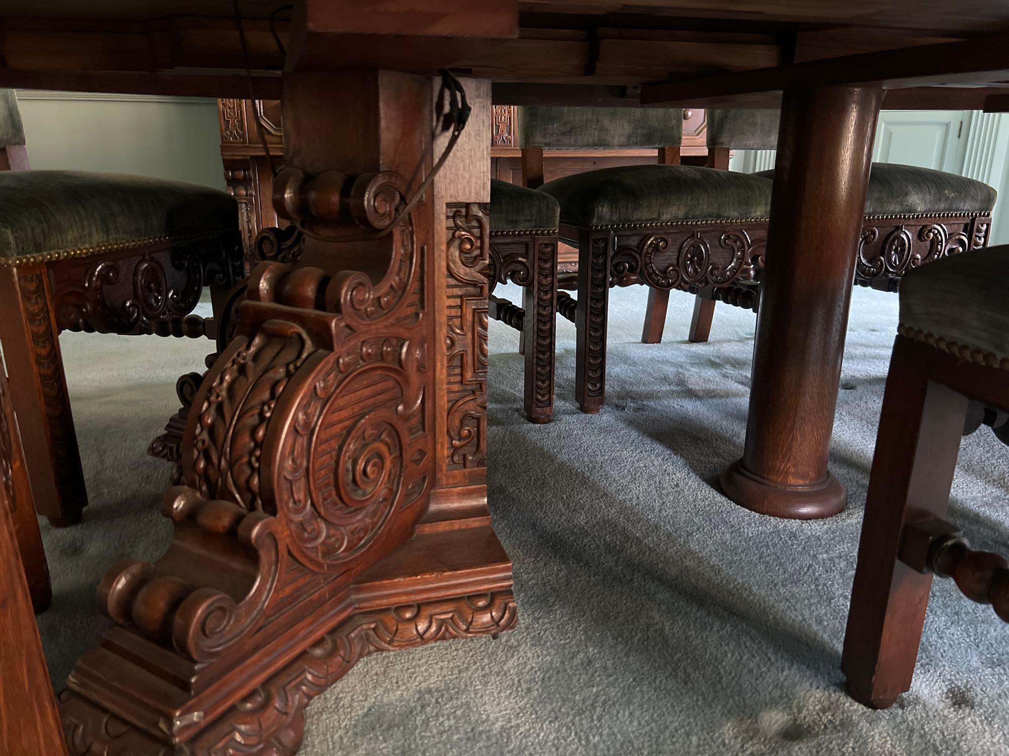 Late 1800s Heavily Carved Oak Dining Table with 10 Chairs