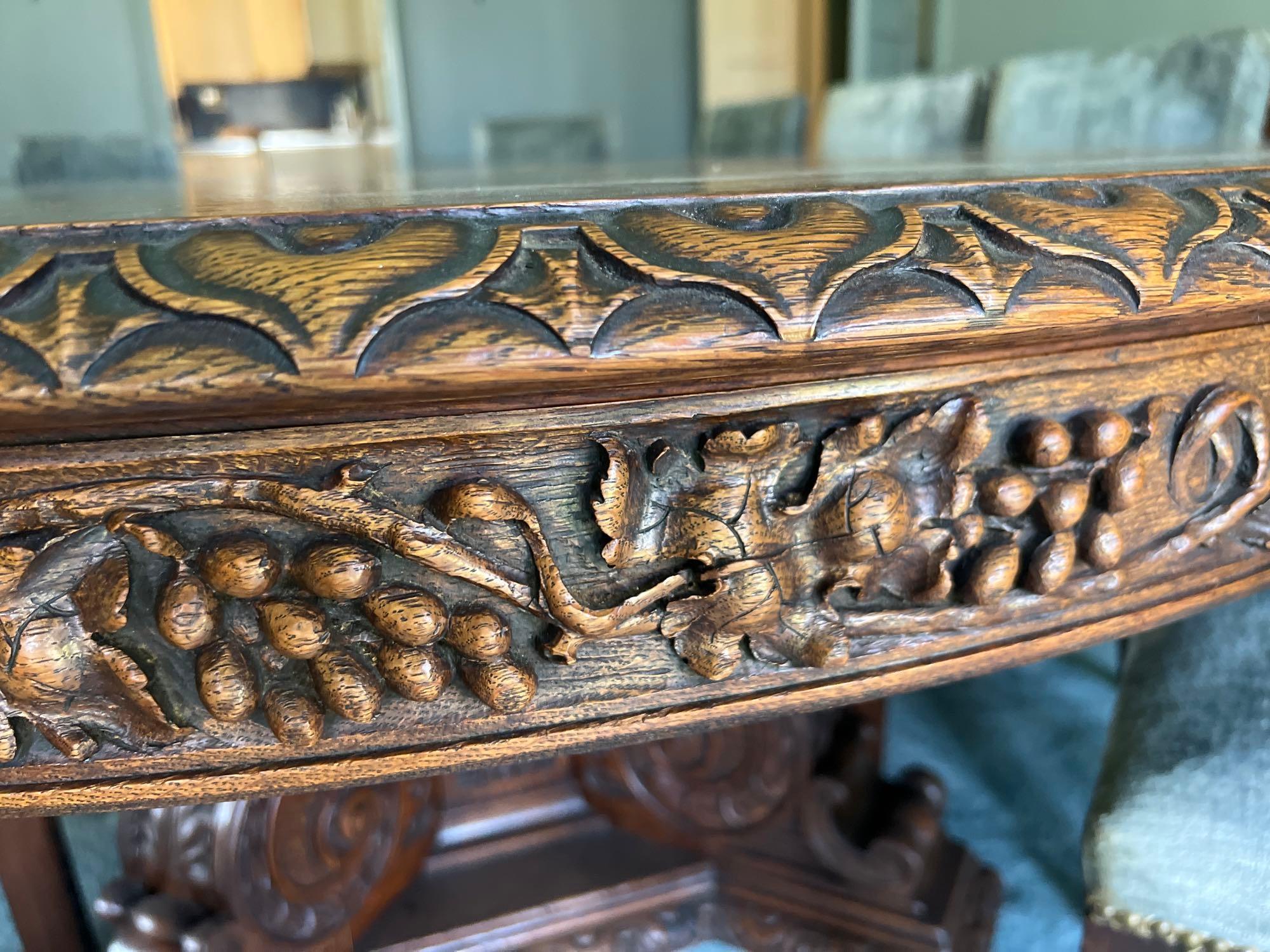 Late 1800s Heavily Carved Oak Dining Table with 10 Chairs