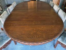 Late 1800s Heavily Carved Oak Dining Table with 10 Chairs