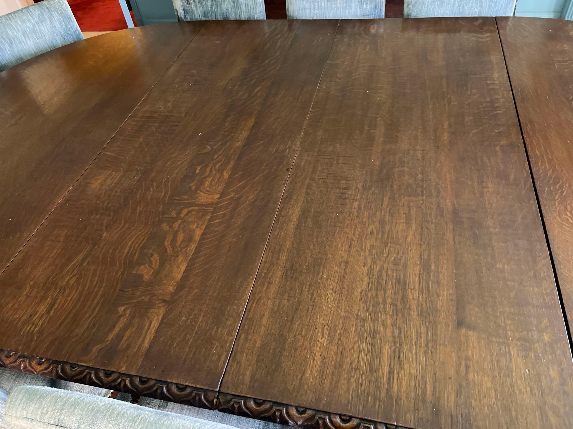 Late 1800s Heavily Carved Oak Dining Table with 10 Chairs