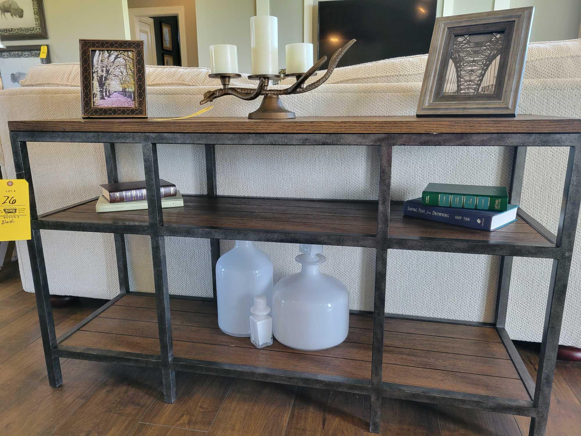 Contents of shelf, glass jars, books, antler themed candle holder and frames