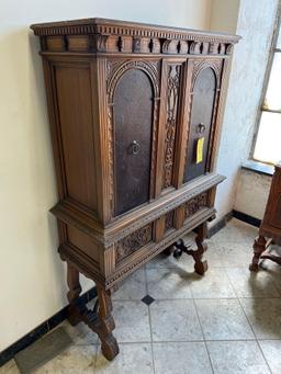 1940s Ornate Wood Dining Room Hutch with Leather Inlay Doors and Wrought Iron Accents