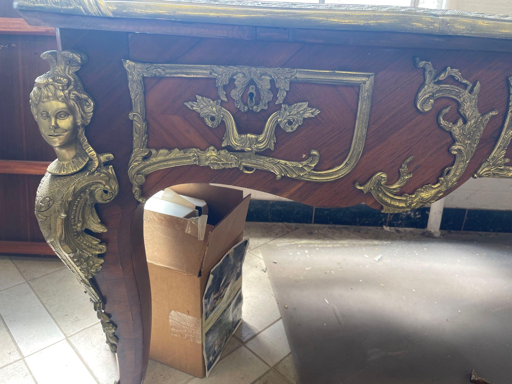 1960s French Louis XV Style Ornate Carved Wood Desk With Figural Accents and Leather Inlaid Top