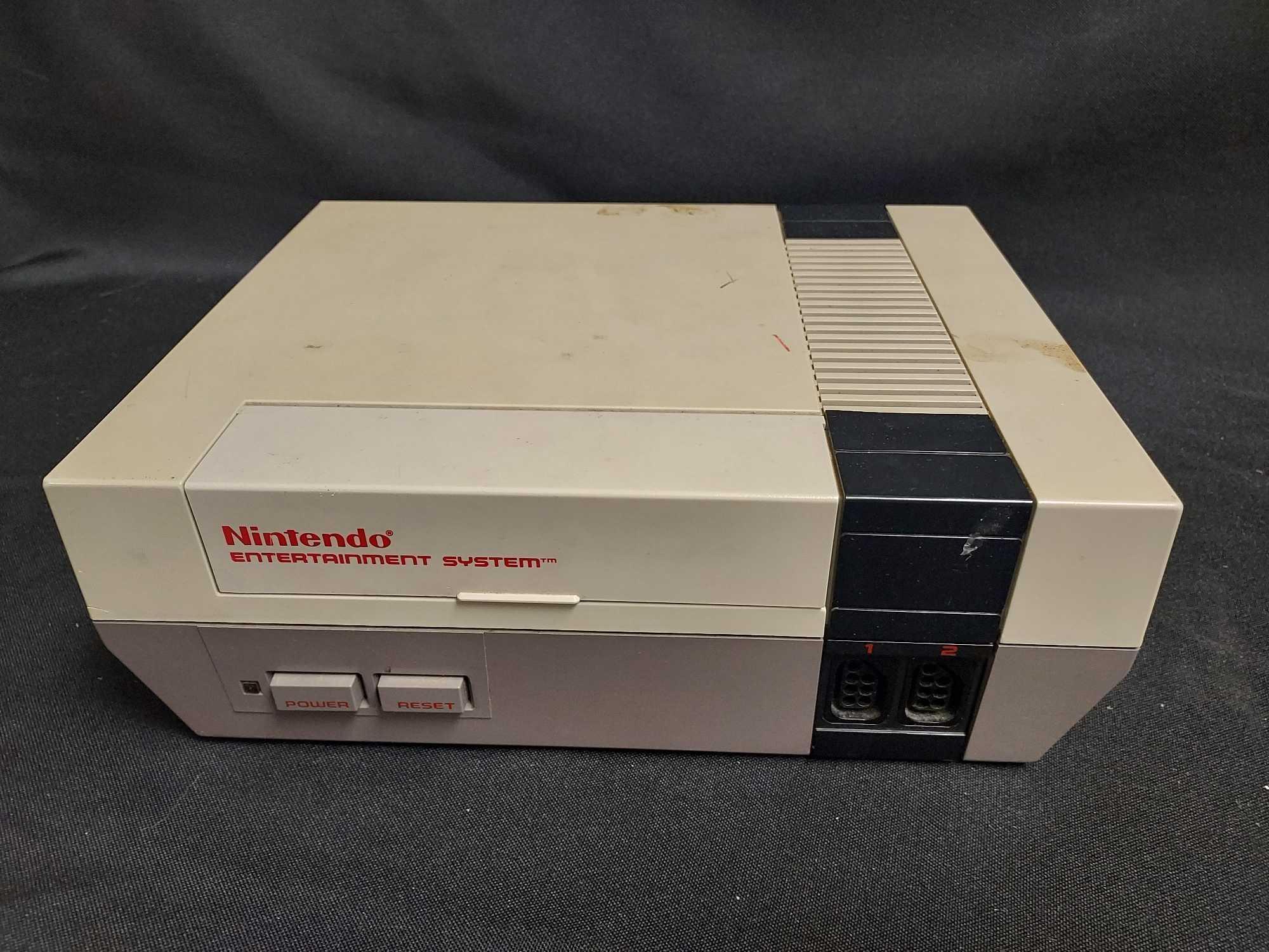 Nintendo NES Entertainment System, 2 Sega Genesises, Game Assortment, & Large Assortment of Cables,